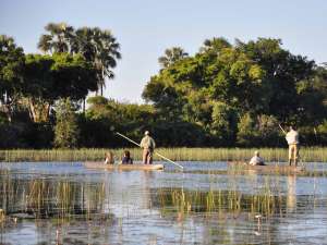 Botswana Luxusreise Okavango Delta Safari Mokoro Boot Luxus Lodge